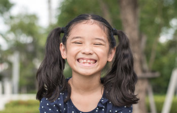 smiling girl in the garden